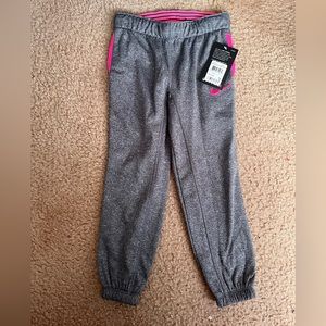 Kids Nike therma dry fit sweats.